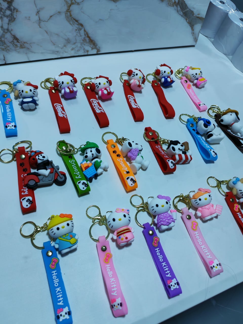LLAVERO HELLO KITTY y SNOOPY